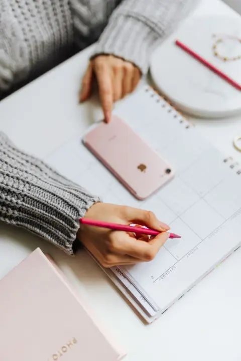 A person planning a schedule